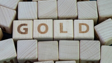 Photo of Gold Price Pressured as Upbeat Data and Less Dovish Fed Support Yields