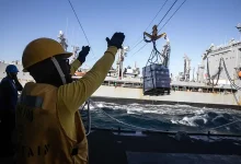 Photo of Houston native participates in a replenishment-at-sea aboard USS Wayne E. Meyer