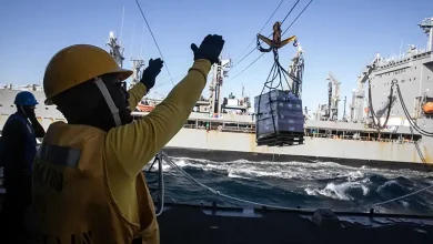 Photo of Houston native participates in a replenishment-at-sea aboard USS Wayne E. Meyer