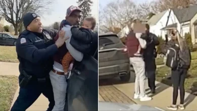 Photo of Video Shows Police Pinning Man Against SUV While He Holds Baby, Raising Concerns Over Child’s Safety and Sparking Public Outcry