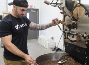 Photo of Monadnock Ledger-Transcript – BUSINESS: Parker Russell overcomes obstacles to build Black Ink Coffee