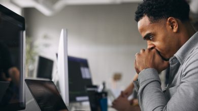 Photo of Zoom And Deloitte Scale Back Employee Benefits In Move That Could Signal Broader Workplace Shift – AfroTech