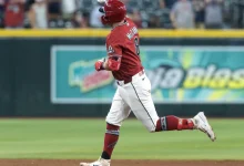 Photo of Diamondbacks reclaim playoff spot with the most September win imaginable
